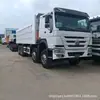 Exportação transfronteiriça de caminhões basculantes HOWO usados, caminhões de terra HOWO de 12 rodas, caminhões basculantes traseiros de 371 cavalos de potência