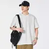 Nueva camiseta de verano retro americana de cuello redondo y manga corta para hombre, corte holgado, camiseta base de retazos de alta resistencia, hombro normal, top de marca de moda