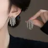 Pendiente de Clip para Oreja con Borla de Perlas y Fuegos Artificiales de Bola de Metal Sin Agujeros en las Orejas Diseño de Nicho Femenino Pendientes Moda de Internet Pendientes Distintivos
