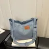 Bolsa jeans muito estilosa, novo modelo verão 2026, moderna, fashion, simples, versátil, bolsa de ombro e transversal casual