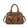 Bolso de hombro más vendido transfronterizo, nuevo modelo para mujeres de mediana edad, bolso de hombro y cruzado práctico, bolso de mano simple para suegra o mamá