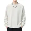 2025 Nueva Selección de Tecnología Camiseta Interior Cálida de Color Puro Manga Larga Negra Popular para Jóvenes Tipo Holgado de Algodón