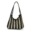 Bolso de cesta tejida para mujer 2026 nuevo de moda casual estilo vacacional perezoso de un solo hombro para llevar debajo del brazo bolso tote bolso de trabajo