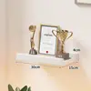 Estantería de pared Mueble flotante para TV en sala de estar Estante de almacenamiento de pared de una sola palabra Máquina para juguetes caseros Estante de almacenamiento de caja superior