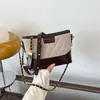 Bolso pequeño de cadena acolchado de diamante para mujer 2026 otoño nuevo estilo bolso cuadrado pequeño simple de moda bolso de un solo hombro cruzado con personalidad elegante