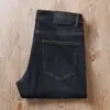 Estación europea primavera y verano finos de alta gama jeans para hombre azul oscuro lavado de negocios trabajo elásticos rectos pantalones casuales