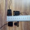 Los fabricantes producen y venden accesorios de hebilla de cuerda para teléfono móvil, hebilla de avión, cinturón de identificación