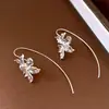 Pendientes Colgantes de Flor de Iris Transfronterizos Europeos y Americanos con Tacto Metálico, Ganchos de Oreja de Moda y Elegantes, Pendientes de Nicho de Lujo Ligero de Gama Alta
