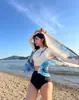 Traje de baño para mujer transfronterizo versión coreana Dongdaemun dividido de manga larga transpirable protección solar adelgazante traje de baño diosa de vacaciones en la playa