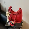 Bolsa quadrada pequena de mão fresca popular deste ano para mulheres, novidade de verão 2026, cor sólida, textura, bolsa de ombro única, bolsa para trabalho, bolsa transversal