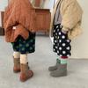 Ropa infantil de Corea del Sur niños nueva ola punto material de lana shorts niños y niñas bebé otoño e invierno lunares lana estilo occidental shorts