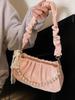 Bolso de mano francés de nicho, popular este año, con plisado bajo las axilas y cuentas, bolso cruzado de textura de alta gama para uso diario.