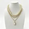 Cadena de Perlas Oceánicas de Venta Caliente Transfronteriza Europea y Americana Cadena para Clavícula de Mujer Colgante de Estrella de Mar y Concha Collar Multicapa Apilable Venta al por Mayor