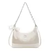 Bolsa de Ombro Simples Estilo Coreano Nicho para Axila Feminina Nova Moda Primavera/Verão 2026 Bolsa Transversal para Trabalho e Deslocamento