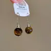 Brincos Olho de Tigre Estilo Melanoid Retro Senso de Design de Nicho Brincos Versáteis Luxo Leve Moda de Alta Qualidade Brincos de Tarraxa para Mulheres