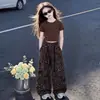 Conjunto de Verano 2026 para Niñas, Nuevo Estilo Coreano, Camiseta de Manga Corta de Moda y Pantalones de Pierna Ancha con Estampado de Leopardo, Conjunto Casual de Verano para Niños Mayores