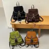 Mochila casual de cordón de estilo coreano de nicho para mujer, nueva colección de otoño, diseño multibolsillos, chic y versátil para ir al trabajo, con un ambiente preppy universitario
