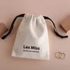 Bolsa de Lona Blanca con Cordón de Alta Venta para Empaquetar Joyería, Perfume y Dulces, Bolsa de Algodón Puro con Cordón con Impresión de Logo para Almacenamiento