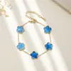 Suministro de fábrica pulseras de acero de titanio lucky trébol de cuatro hojas flor de cinco pétalos nácar tendencia europea y americana de lujo nicho sin decoloración al por mayor