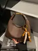 Bolso con un Toque de Lujo de Nicho, Exquisito y de Lujo Ligero, Bolso Vintage Mate para Mujer para el Trabajo, Bolso Versátil Tipo Dumpling, Transfronterizo