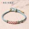Pulsera de flor de durazno Zhao puede usar cuentas de transferencia de oro duro 3D este año cuerda roja para enviar parejas novias cuerda de mano libre al por mayor