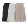 Conjunto de verano coreano casual de ajuste ceñido para mujer con top de tirantes de lunares negros y falda recta