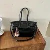 Bolsa de Mão Grande Capacidade em Couro Macio Vintage 2026 Nova Moda para o Trabalho Bolsa Transversal Única Tendência Ins Bolsa de Ombro Único