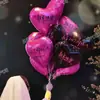 Lanzamiento de Globos Año Nuevo 2027 Año de la Oveja en la Zona Escénica, Globos de Helio Flotantes en Forma de Corazón para Celebraciones de Año Nuevo