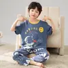 Pijama de Menino 2026 Verão Manga Curta Calça Longa Algodão Puro Novo Estilo Alunos do Ensino Fundamental Meninos Desenho Animado Gola Redonda Conjunto de Roupas para Casa