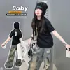 Conjunto de Dos Piezas para Niñas 2026 Verano Nuevo Camiseta de Manga Corta y Jeans Anchos Estilo Americano Desgastados Moderno