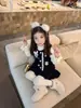 Conjunto de inverno espesso para meninas 2026 novo estilo infantil desenho animado colete acolchoado e saia conjunto de três peças roupas de inverno para bebês meninas