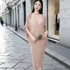 Comercio exterior transfronterizo vestido Miyake lujo ligero sentido de alta gama cuello en V manga murciélago holgado talla extra cubre carne temperamento ceñido a la cadera falda