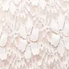 Yuchang primavera y verano nuevo hilo grueso brocado spandex alta elasticidad encaje tela microtransparente patrón de encaje de planta de trébol de cuatro hojas tela
