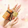 Pingente de bolsa de celular da sorte trevo de quatro folhas dourado, chaveiro de ouro maciço, pingente de bolsa para batom, pequeno presente promocional para o Festival Qixi
