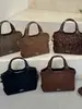Bolsa de cubo de moda retro de alta gama 2026 transfronteriza, bolso de mano versátil casual, bolso de hombro, bolso cruzado