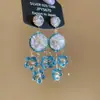 Aretes Flor de Cristal Azul Aguja de Plata, Aretes Dulces Estilo Vacaciones en la Costa, Aretes Simples y Versátiles con un Diseño Único