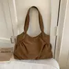 Bolsa de Suede para Outono e Inverno para Mulheres Pedido Estrangeiro 2026 Nova Grande Capacidade Fashionável Versátil para o Dia a Dia Bolsa Tote de Ombro Retrô