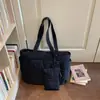 Bolso tote de color liso, estilo suave y relajado, moda coreana para chicas jóvenes, adecuado para el uso diario y salidas de vacaciones, un bolso casual