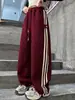 Pantalones Deportivos Casuales con Raya Lateral para Niñas Primavera y Otoño 2025 Nuevos Pantalones Rectos de Pierna Ancha de Moda para Niños Mayores