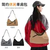 Bolso de hombro de estilo casual para mujer, nuevo modelo 2026, bolso cruzado de gran capacidad para el día a día, bolso tote de moda simple y versátil para hombre
