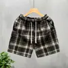 Shorts de pata de gallo para hombre de marca casual de lujo, nuevo estilo verano 2025, shorts de playa rectos holgados de cuatro puntos, pantalones casuales retro