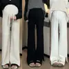 Moda Gestante 2026 outono e inverno calça de gestante que faz as pernas parecerem mais longas, calça longa de tricô versátil com fenda e alças ajustáveis