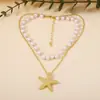 Colar Cruzado de Luxo Leve com Pérolas Artificiais de Alto Padrão, Camada Dupla Empilhada de Estrela do Mar, Moda Versátil, Estilo de Feriado, Nicho