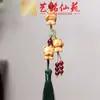 Pulsera Artesanal de Madera con Semillas de Cascabel, Cascabel de Agitar a Mano, Carrillón de Viento de Cáscara de Fruta de los Deseos, Colgante para Bolso, Llavero para Teléfono