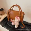 Moda Estilo Coreano Retro Bolso Cuadrado Pequeño para Mujer 2026 Nuevo Diseño Pequeño de Nicho Bolso de Mano Pequeño Bolso Cruzado Simple Versátil