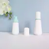 En stock botella cónica blanca de espuma de 60 ml, botella espumadora de PET para mousse de 100 ml, dispensador portátil de espuma facial