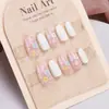 Set de Uñas Portátil, 10 Piezas, Otoño e Invierno Cortas Ovaladas Lindas Frescas Rosa y Blanco Flor Pequeña Dulce Manicura Portátil