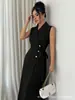 Vestido Largo Negro de Verano 2026 con Solapa, sin Mangas, Cintura Ceñida con Cinturón, para Viajes