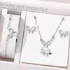 Conjunto de Quatro Peças Elegante e Versátil de Colar, Pulseira, Brincos e Anel com Laço para Mulheres, Conjunto de Joias Moderno e de Alta Qualidade
