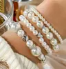 Venta Caliente Transfronteriza Traje de 4 Piezas Pulsera Perla de Amor para Mujer Pulsera Explosiva de Moda Hecha a Mano con Perlas